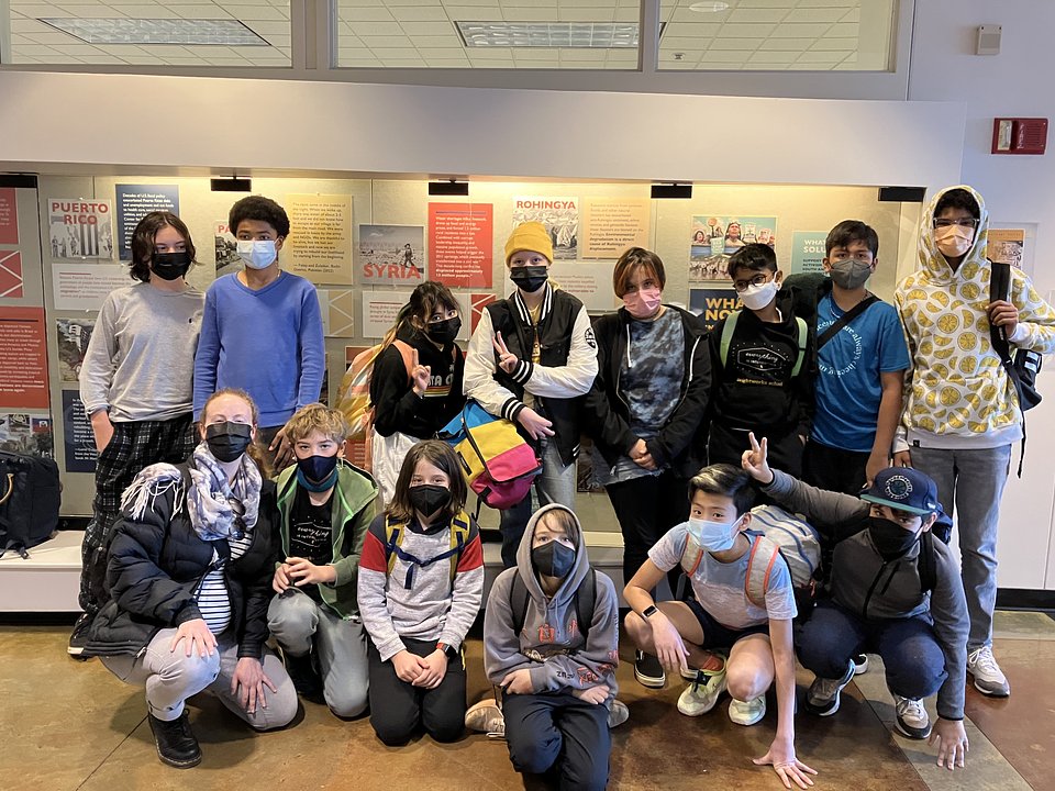 Implementation planning grantee East Bay Sanctuary Covenant’s pilot middle school group at a launch event for their project Amplifying Sanctuary Voices and Climate Migration Exhibit.