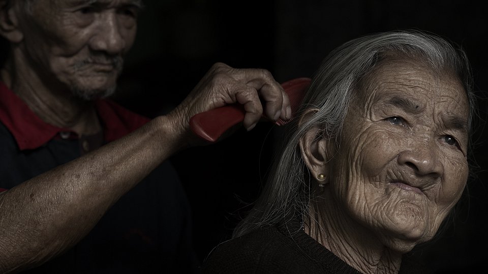 Morning routine means taking care of his wife, Vietnam (KhoÌi Phan/AGORA images)